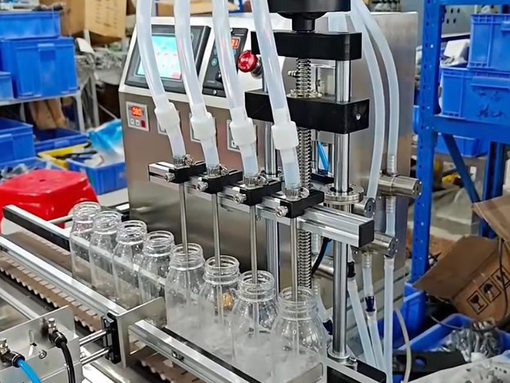 四头小型桌面式液体灌装机